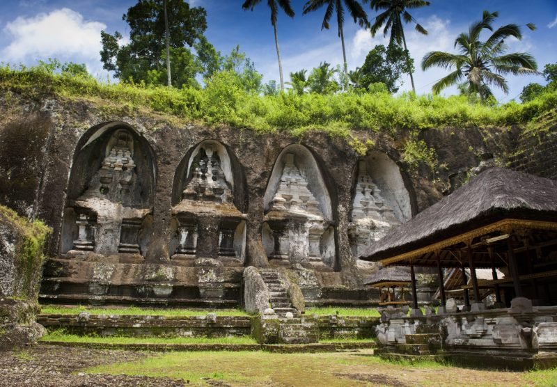 Gunung Kawi is a temple complex centered around royal tombs carved into stone cliffs in the 11th century. It is located amid scenic rice terraces about 30 minutes from Ubud.