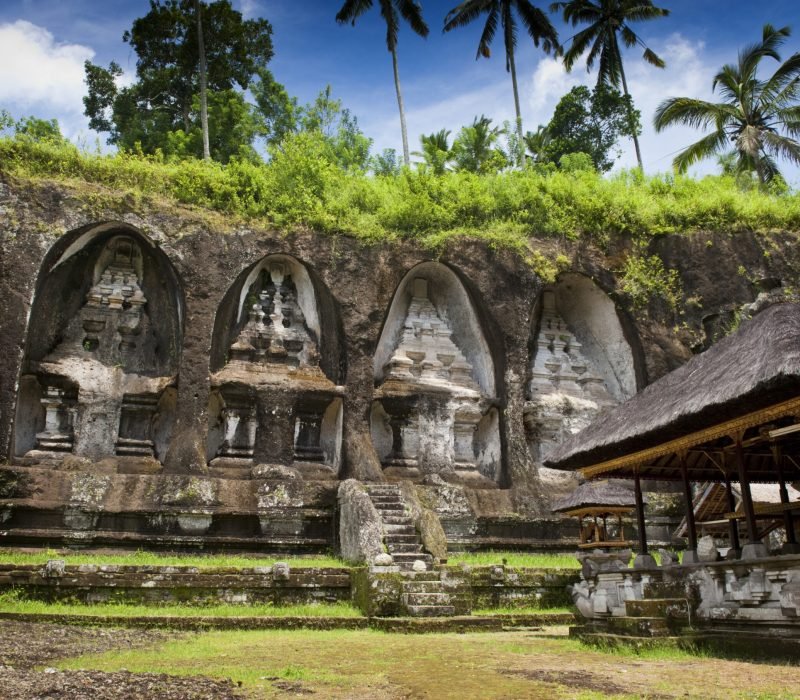 Gunung Kawi is a temple complex centered around royal tombs carved into stone cliffs in the 11th century. It is located amid scenic rice terraces about 30 minutes from Ubud.
