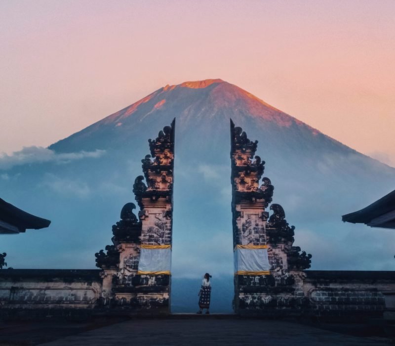 Traveler Standing at the Gates of Pura Lempuyang Temple aka Gates of Heaven Bali, Indonesia