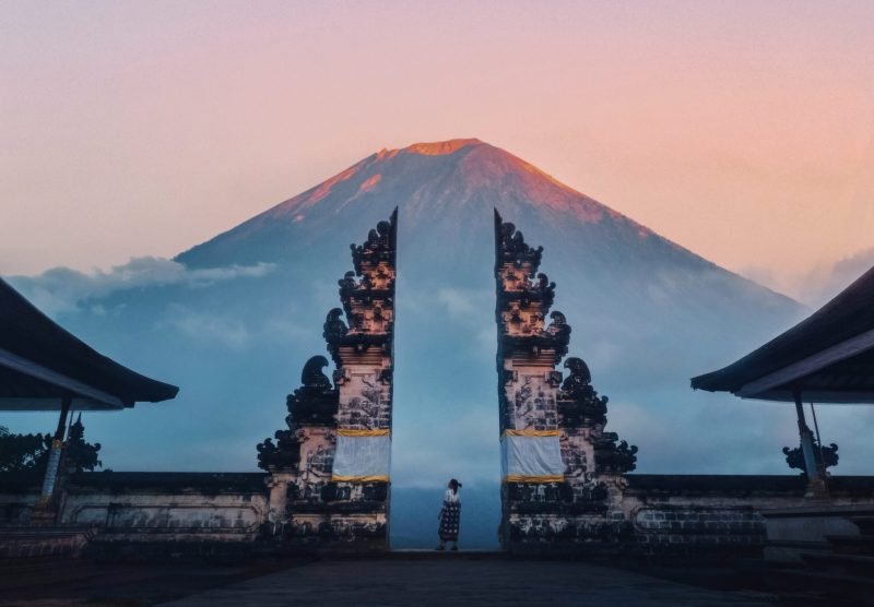 Traveler Standing at the Gates of Pura Lempuyang Temple aka Gates of Heaven Bali, Indonesia