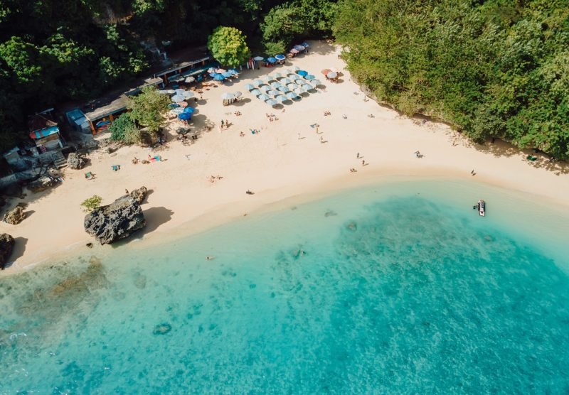 Aerial,View,Of,Padang,Padang,Beach,With,Turquoise,Ocean.,Vacations