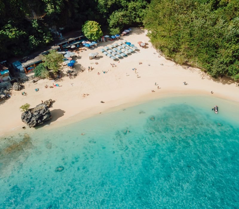 Aerial,View,Of,Padang,Padang,Beach,With,Turquoise,Ocean.,Vacations
