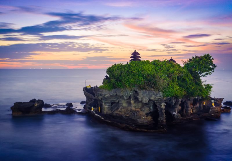 Tahan Lot Hindu temple in Bali, on sunset.