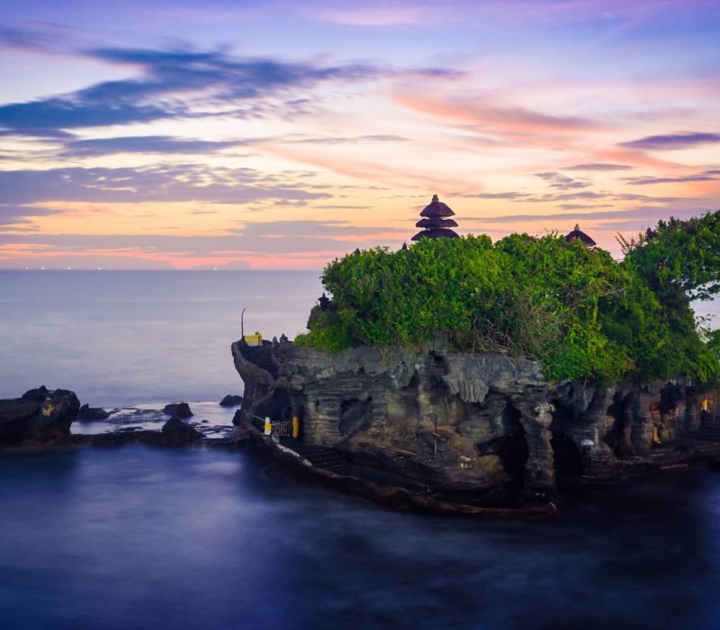 Tahan Lot Hindu temple in Bali, on sunset.